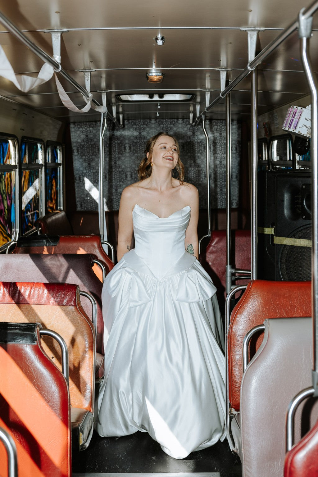 Serafina duchess satin wedding gown on vintage bus