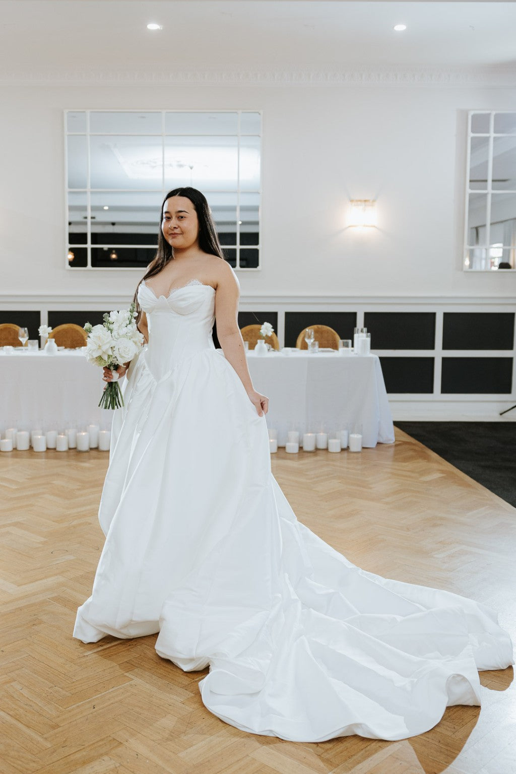 Allegra couture Mikado wedding ballgown in elegant reception venue