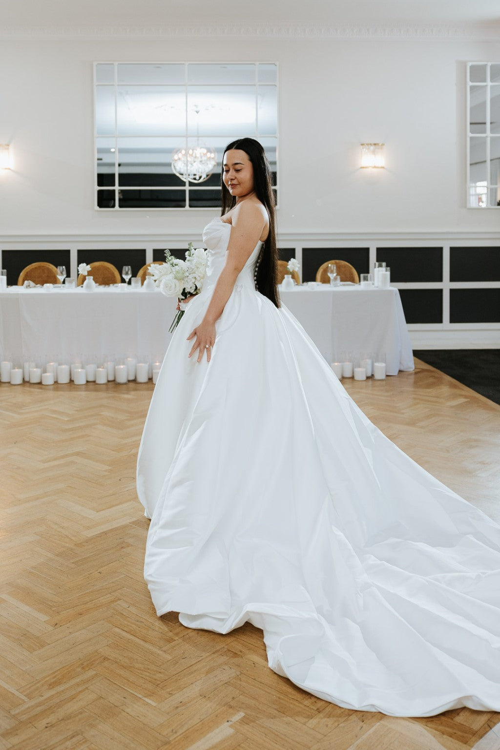Allegra Mikado wedding gown sculpted silhouette side view