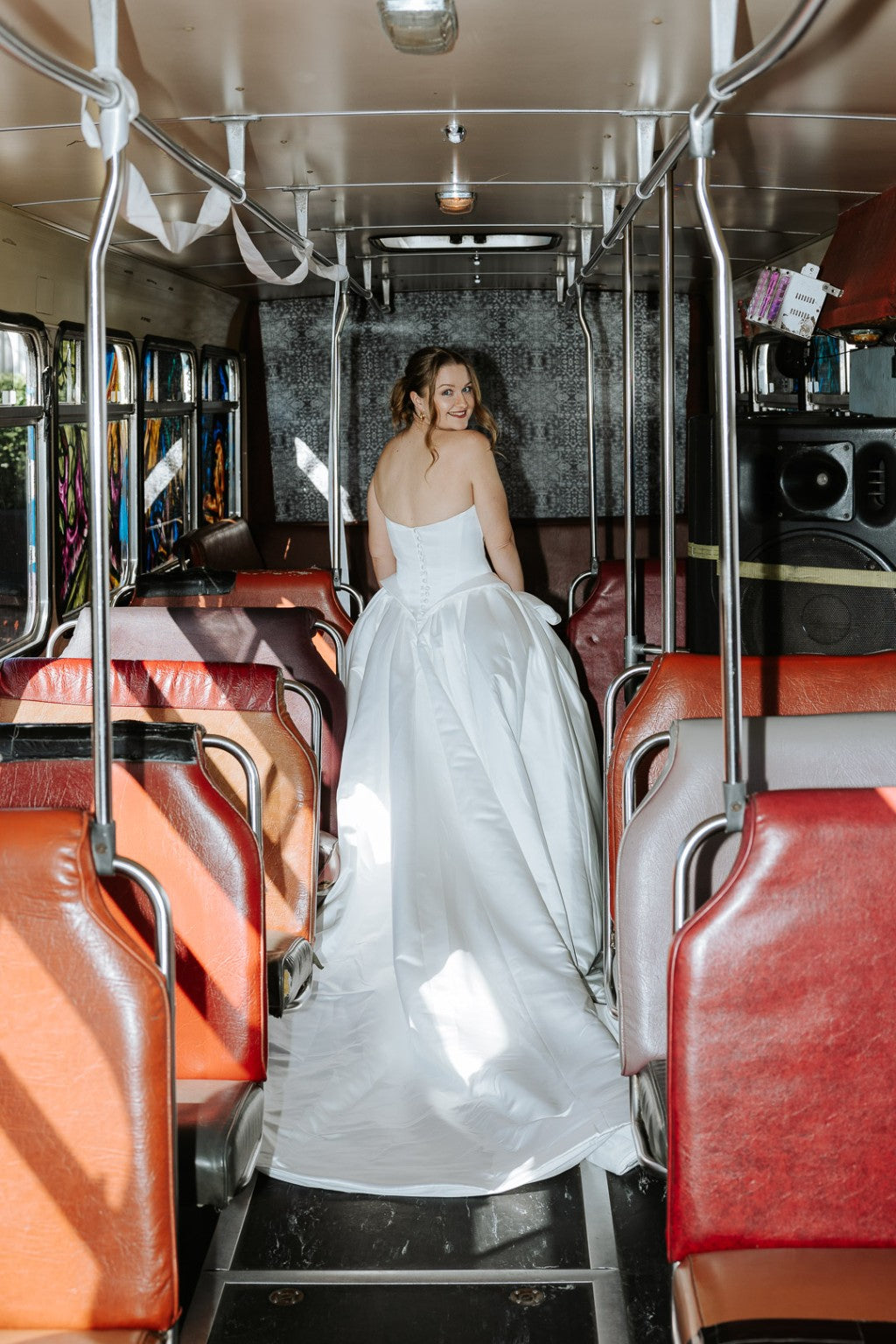 Serafina satin wedding gown back with covered buttons and long train