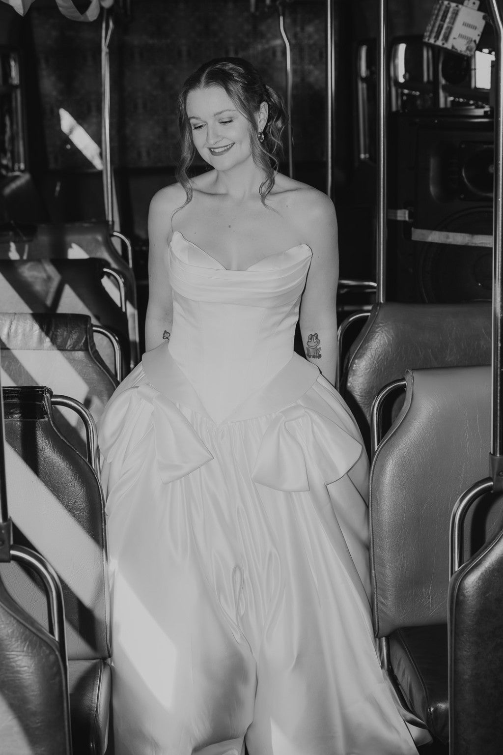 Black and white portrait of Serafina strapless satin bridal dress
