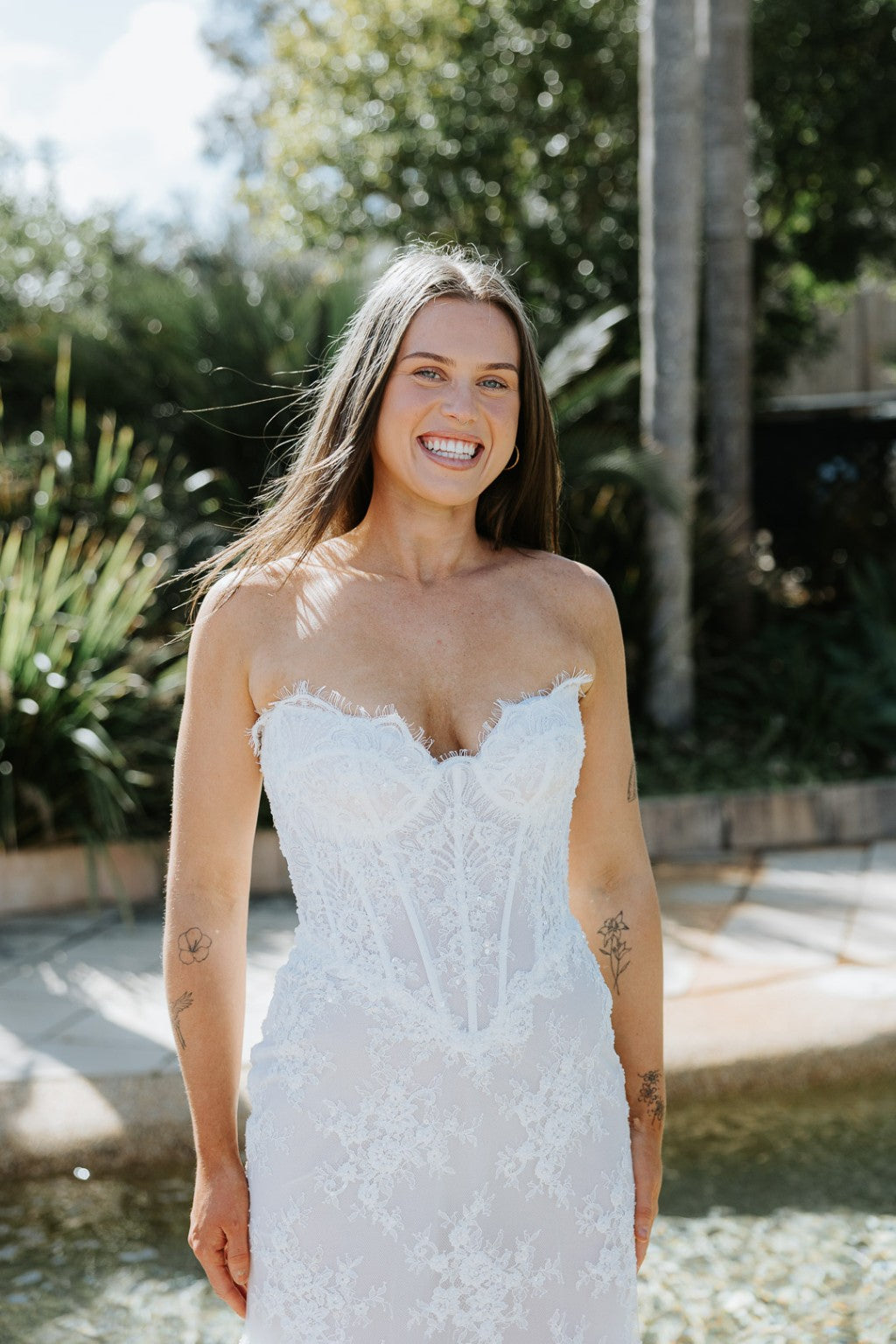 Close-up of Vittoria wedding gown's French lace corset bodice