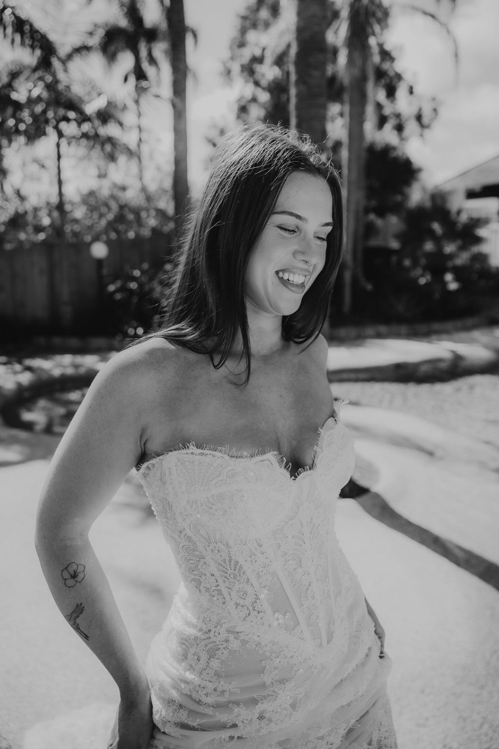 Black and white photograph of Vittoria strapless lace corset gown