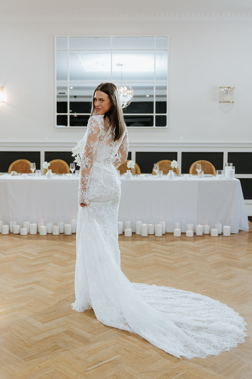 Vittoria couture lace wedding gown with dramatic train
